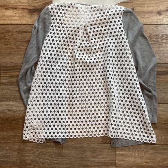 gray cardigan sweater with a white, eyelet-patterned fabric lining the back - Picture 6 of 6
